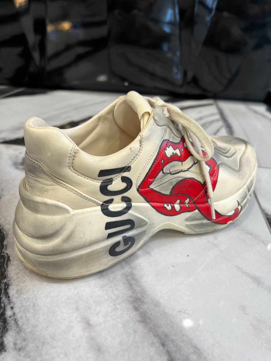 GUCCI DISTRESSED CALFSKIN MOUTH PRINT RHYTON SNEAKERS