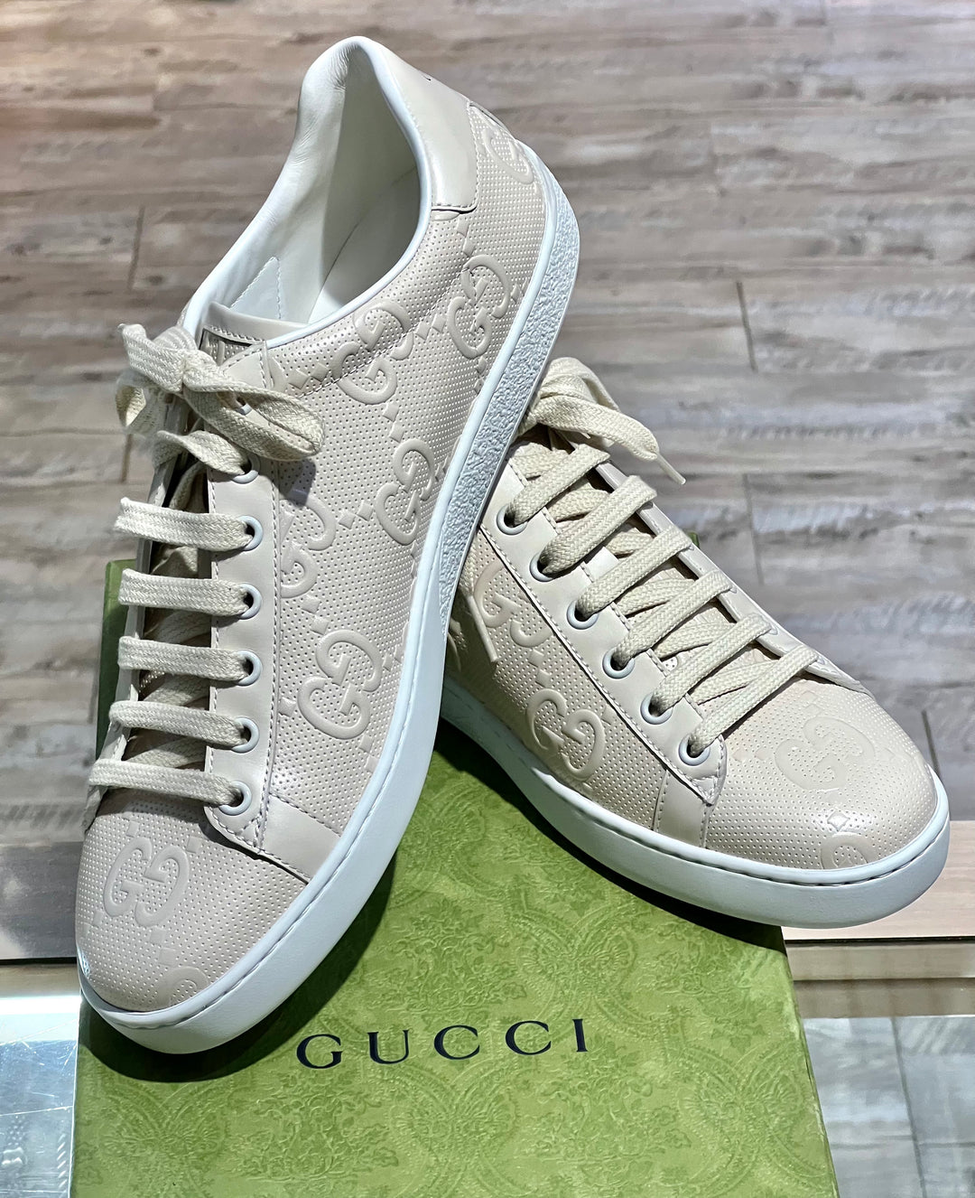 GUCCI GG EMBOSSED ACE SNEAKERS