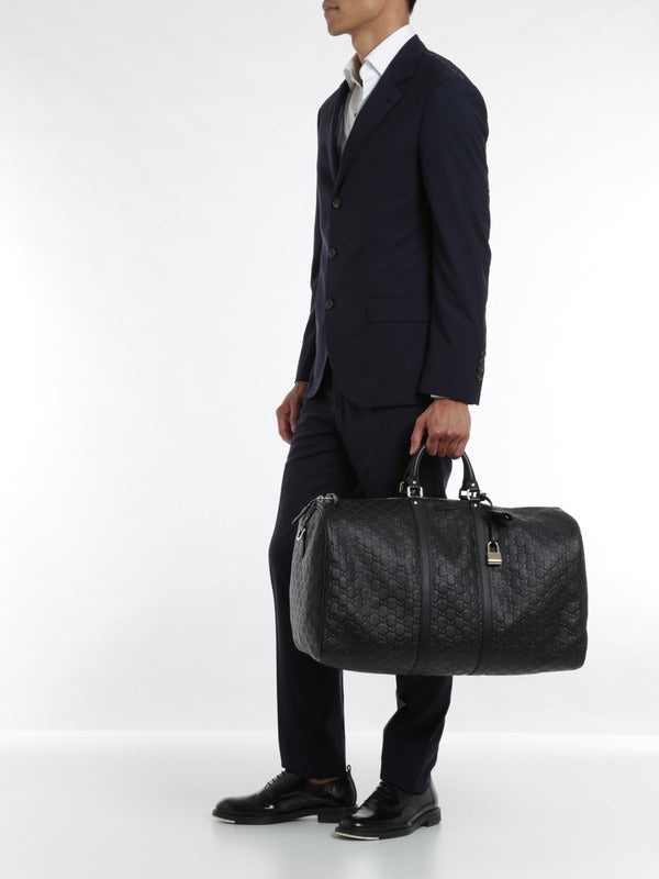 Gucci GG Embossed Leather Duffle Bag – FUTURO