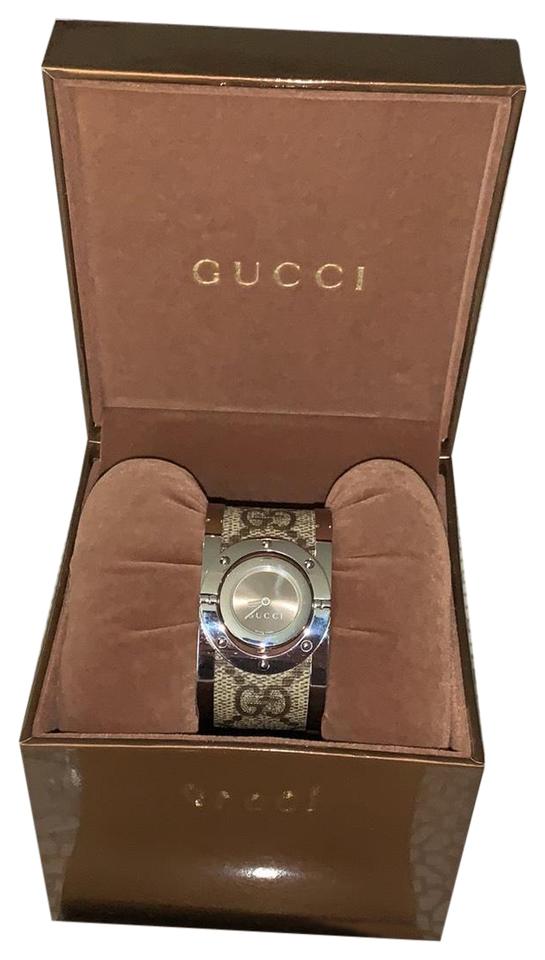 GUCCI SWISS TWIRL GUCCISSIMA STAINLESS WATCH