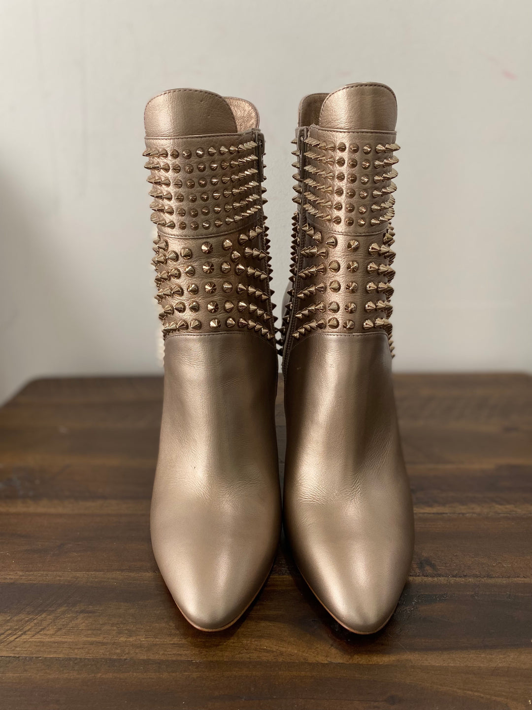 CHRISTIAN LOUBOUTIN HONGROISE SPIKED RED SOLE BOOTIES