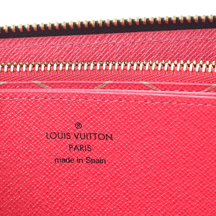 LOUIS VUITTON MONOGRAM SUMMER TRUNKS ZIPPY WALLET