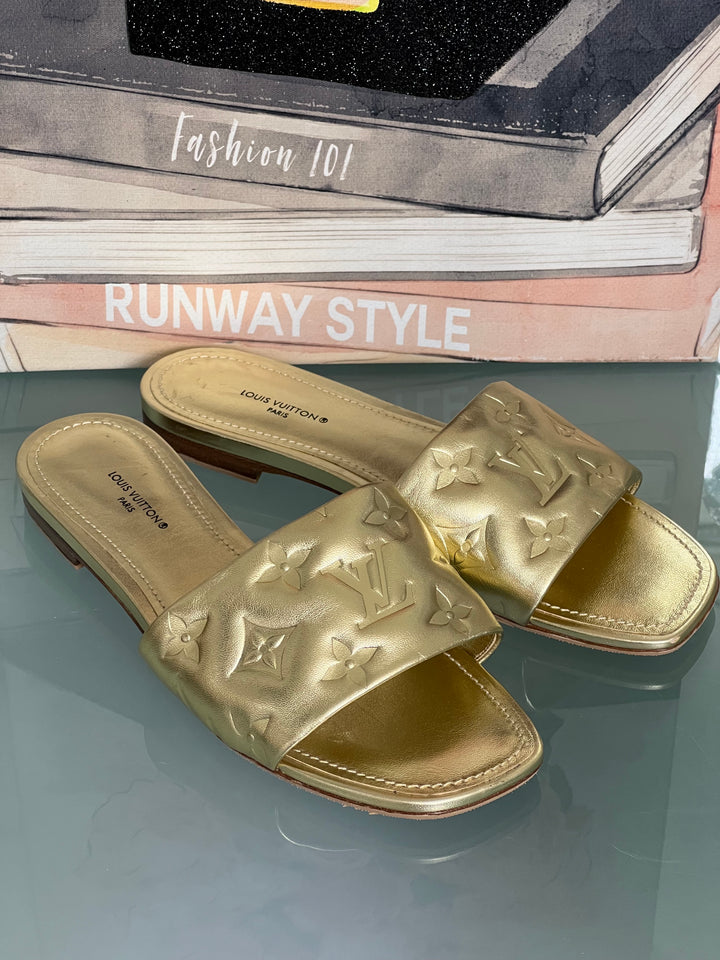 LOUIS VUITTON REVIVAL FLAT MULES