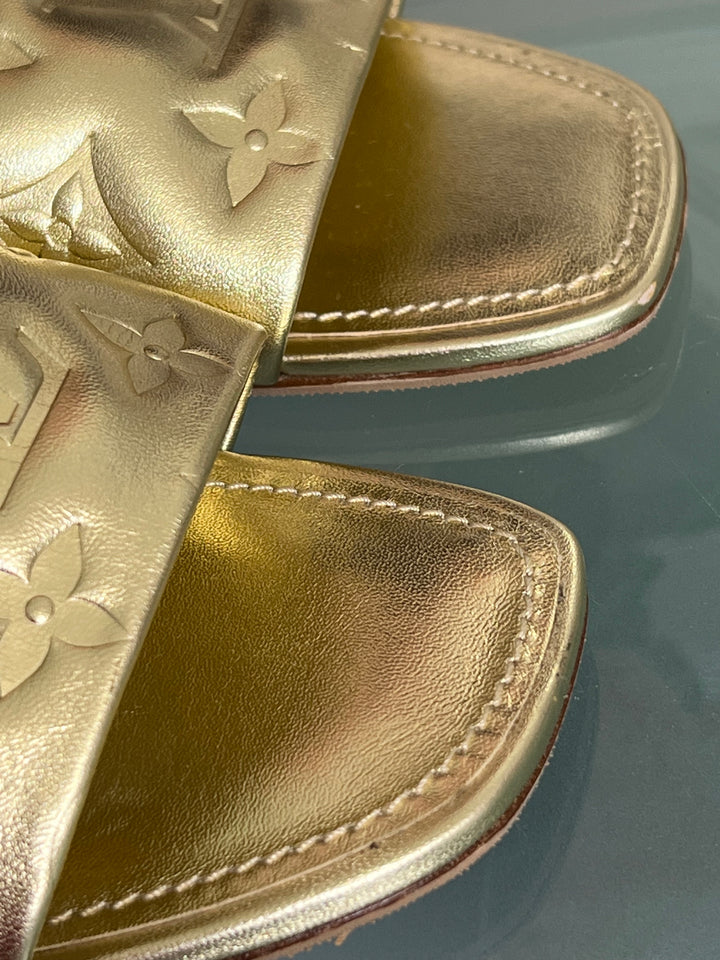 LOUIS VUITTON REVIVAL FLAT MULES