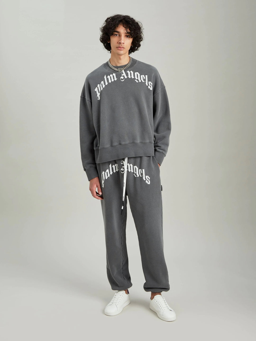 PALM ANGELS CURVED LOGO SWEATPANTS