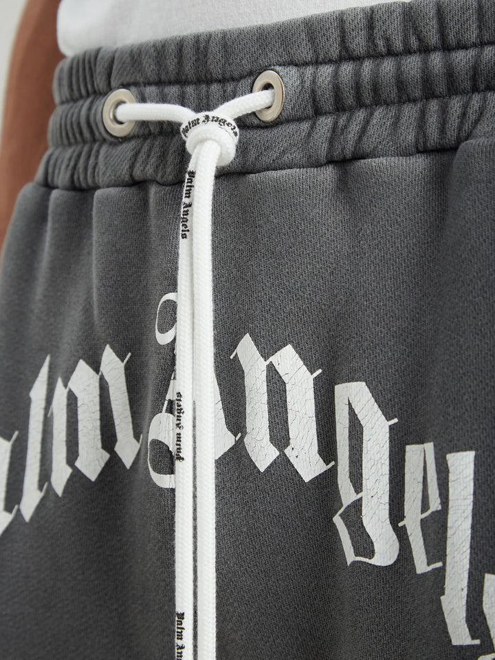 PALM ANGELS CURVED LOGO SWEATPANTS